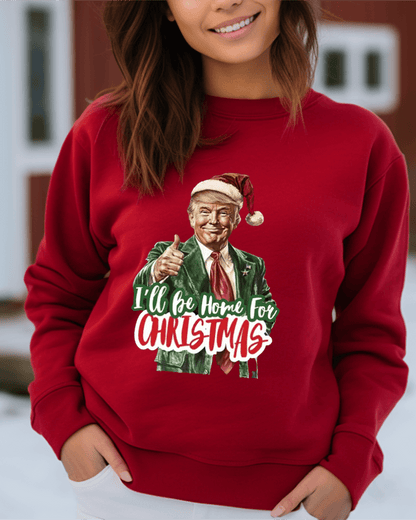 Woman wearing red sweatshirt with "I'll Be Home For Christmas" Trump DTF transfer, showcasing premium print quality in Weston Florida.